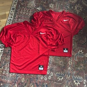 Two Red Nike Football Training Shirts